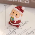 Miniatur Kunstharz Weihnachtsmann Figur mit Geschenk, süße Christbaumschmuck Deko. - Weihnachtsmann