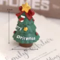 Kleine Harz Weihnachtsbaum Ornament, festliche Tischdeko mit Stern und roter Schleife. - Weihnachtsfamilie-Sternenbaum