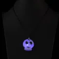 Close-up detail of the glowing Halloween skull pendant necklace with led lights on display. - Skull Shape (Necklace)