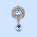 Rhinestone alloy brooch finding detail, vintage metal flower tray with clear crystal drops. - White