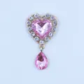 Detailed close-up of a golden alloy heart rhinestone DIY pendant with pink crystal and drop charm. - Light Pink