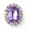 Close-up detail of oval purple rhinestone crystal button for DIY craft sewing decor. - Light Purple