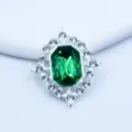 Close-up detail of silver diamond rhinestone decorative buckle for DIY shoes and clothing crafts. - Dark Green