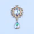 Detailed view of the 25x46mm alloy filigree rhinestone oval brooch base DIY badge accessory. - AB Color