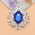 Ovale legering strass knoop met donkerblauwe kristal voor DIY kledingaccessoires. - Saffierblauw