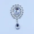 Silver alloy rhinestone acrylic pendant DIY clothing accessory decorative crystal button detail shot. - White