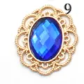 Gold filigree metal base with blue acrylic gemstone DIY craft jewelry accessory detail close up - Sapphire Blue