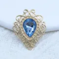 Base de aleación filigrana dorada con gema acrílica azul en forma de gota para DIY. - Azul claro