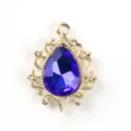 Gold-tone alloy filigree teardrop pendant with dark blue stone for diy jewelry making. - Sapphire Blue