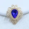 Gold alloy filigree bezel setting with a teardrop blue acrylic rhinestone for DIY crafts. - Sapphire Blue