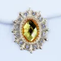 Oval hollow alloy rhinestone DIY charm for jewelry making, hair accessories, and clothing decor. - Golden Yellow