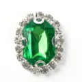Oval green rhinestone button, emerald cut crystal glass gem with clear crystal halo trim. - Dark Green