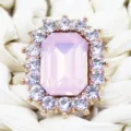Detailed shot of rectangular pink crystal rhinestone button for DIY crafts and hair accessories. - Light Pink