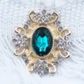 Gold alloy rhinestone flower charm, green acrylic center DIY craft accessory, 28x32mm piece. - Cyan