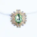 Botón de diamantes de imitación de cristal verde ovalado dorado para lazo de pelo DIY. - Verde claro