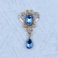 Colgante de estrás azul de aleación de zinc dorada accesorio DIY para ropa y bolsos. - Azul claro