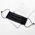 Black imitation silk mask, breathable double layer face covering with adjustable ear loops. - Black