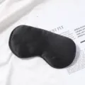 Zwarte zijden slaapmasker voor comfortabele nachten, zacht ademend satijnen oogmasker. - Zwart