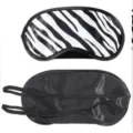 Black and white zebra print sleep eye mask, comfortable satin fabric, light blocking design. - Polyester Zebra Satin