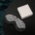 Elegant black satin sleep mask featuring delicate white lace overlay, comfortable and breathable. - White Lace / Black