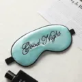 Blue silk sleep mask with Good Night embroidery, adjustable strap and breathable shading design. - Fresh Green
