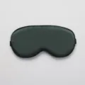 Comfortable solid green silk sleep mask with black trim for block out light and better sleep. - OPP Packaging / Trend Green
