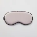 Masque de sommeil en soie rose avec bordure noire et bande élastique, pour un repos confortable. - Violet Taro
