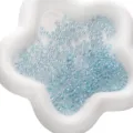 Light blue transparent glass seed beads for DIY handmade bracelets, necklaces, and jewelry making. - 2x4mm / UV Lake Blue