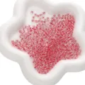 Transparent red glass seed beads bulk for DIY jewelry making, ideal for handmade bracelets. - 2x4mm / UV Red