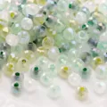 Faceted glass wheel beads dyed core translucent sparkling loose beads for DIY jewelry - Green Series