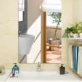 Detail view of wall mounted bathroom mirror sticker showing clear reflection and modern style. - JM701 / S: 20x30cm