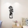 Black flower vase wall art detail showing rose silhouette sticker mounted on bedroom wall for home decor. - Size S / Black