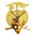 Gold mirror owl wall clock with black hands and cutout numbers for modern home decor. - Gold