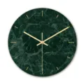 Close-up of the elegant dark green marble pattern clock face with gold hands and minimalist markers. - Green Marble (CC008)