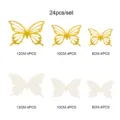 Detailed view of 24pcs 3D hollow metallic butterfly wall stickers set in various sizes for decor. - Gold & Pearlescent Paper Ivory White