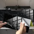 Black marble pattern tile sticker detail shot, thickened crystal film wall paper for kitchen renovation. - DLS059