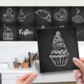 Close up view of retro chalk art kitchen tile sticker showing detailed coffee cupcake pattern. - ET236