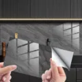 Detail view of self-adhesive marble pattern wall sticker backing peel demonstration. - DLS110 Crystal Film