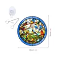 Stained glass bird suncatcher detail view showing vibrant colorful avian pattern and hanging chain. - Size L