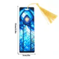 Stained glass style acrylic bookmark with golden tassel, fantasy mountain night sky design detail view. - SQTYU039