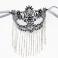 Elegant black metal masquerade mask with sparkling rhinestones and delicate tassel chains for parties. - Black Metal Six-Petal Tassel Mask