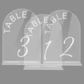 Clear acrylic arched table numbers with stands, perfect for wedding reception and event decor. - BTU328: 2mm Transparent