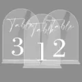Close-up detail of transparent acrylic arch table number signs with bases for wedding decor. - BTU329: 2mm Transparent Color