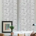 Close-up scene of silver Moroccan fish scale window film showing frosted privacy texture. - BL094