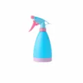 Close-up detail of the 500ml candy colored plastic spray bottle, hand pressure watering nozzle. - Blue