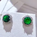 Raffinati orecchini a lobo floreali con gemma verde e strass scintillanti dettagli. - Orecchini / Verde