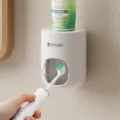 Wall-mounted automatic toothpaste dispenser with dustproof cover, punch-free household squeezer. - White