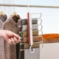 Multifunctionele meerlaagse inklapbare broekhangers ruimtebesparende kastorganizer voor kleding. - Crème (Aromatherapie Broekenhanger)