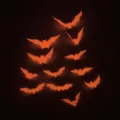 Halloween 3D luminous glowing bat wall stickers for holiday party and window decoration. - 12-Piece Set / Red