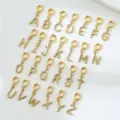 Ciondoli con lettere intrecciate in acciaio inossidabile dorato a-z alphabet diy. - Lettera A / Oro